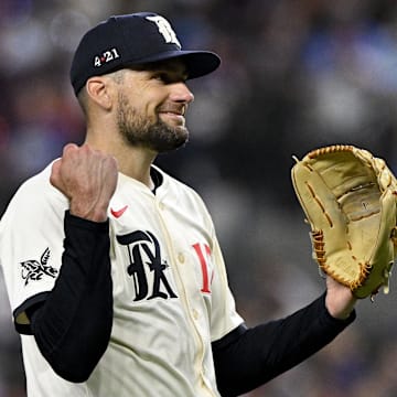 Jul 25, 2025; Arlington, Texas, USA; Texas Rangers starting pitcher Nathan Eovaldi (17) reacts to a call during the fifth inning against the Atlanta Braves at Globe Life Field. 