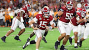 Oct 18, 2025; Tuscaloosa, Alabama, USA; Alabama Crimson Tide quarterback Ty Simpson (15) runs with the ball during the fourth quarter against the Tennessee Volunteers at Saban Field at Bryant-Denny Stadium. Mandatory Credit: David Leong-Imagn Images