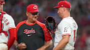 Cincinnati Reds pitcher Brent Suter (31) jokes with manager Terry Francona (77) as he’s pulled in the eighth inning of the MLB interleague game between the Cincinnati Reds and the New York Yankees at Great American Ball Park in downtown Cincinnati on Tuesday, June 24, 2025. The Reds won 5-4 in 11 innings.