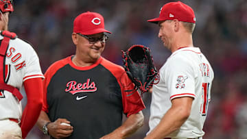 Cincinnati Reds pitcher Brent Suter (31) jokes with manager Terry Francona (77) as he’s pulled in the eighth inning of the MLB interleague game between the Cincinnati Reds and the New York Yankees at Great American Ball Park in downtown Cincinnati on Tuesday, June 24, 2025. The Reds won 5-4 in 11 innings.