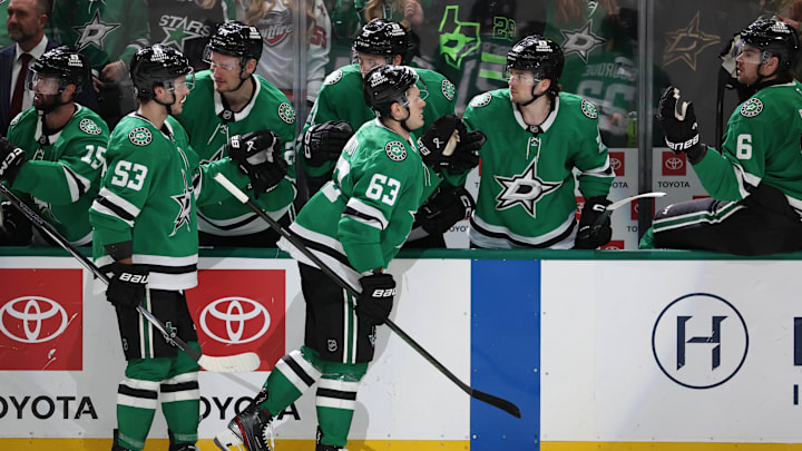 Dec 27, 2024; Dallas, Texas, USA; Dallas Stars right wing Evgenii Dadonov (63) celebrates with teammates after scoring a goal against the Minnesota Wild in the first period at American Airlines Center. Mandatory Credit: Tim Heitman-Imagn Images Dec 27, 2024; Dallas, Texas, USA; Dallas Stars right wing Evgenii Dadonov (63) celebrates with teammates after scoring a goal against the Minnesota Wild in the first period at American Airlines Center. Mandatory Credit: Tim Heitman-Imagn Images