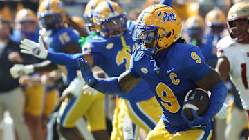Oct 4, 2025; Pittsburgh, Pennsylvania, USA;  Pittsburgh Panthers linebacker Kyle Louis (9) runs after fumble recovery against the Boston College Eagles during the second quarter at Acrisure Stadium. Mandatory Credit: Charles LeClaire-Imagn Images