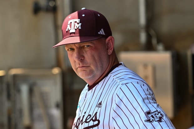 Jun 8, 2024; College Station, TX, USA; Texas A&M head coach Jim Schlossnagle looks on from the dugout prior to a game.