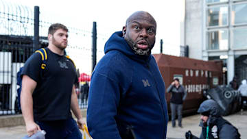 Michigan running backs coach Tony Alford walks off the bus as team arrive for the game between Ohio State and Michigan at Ohio Stadium in Columbus, Ohio on Saturday, Nov. 30, 2024.