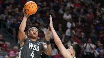 March 9, 2025; Las Vegas, NV, USA; Washington State Cougars forward LeJuan Watts (4) shoots the basketball against San Francisco Dons forward Junjie Wang (35) during the first half in the quarterfinal of the West Coast Conference tournament at Orleans Arena.