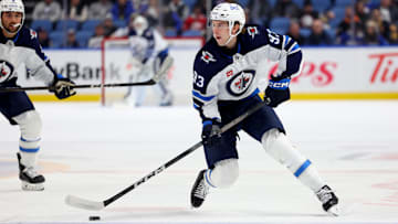 Dec 5, 2024; Buffalo, New York, USA;  Winnipeg Jets center Brad Lambert (93) looks to make a pass during the first period against the Buffalo Sabres at KeyBank Center.