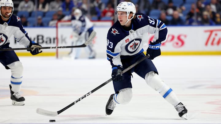 Dec 5, 2024; Buffalo, New York, USA;  Winnipeg Jets center Brad Lambert (93) looks to make a pass during the first period against the Buffalo Sabres at KeyBank Center.