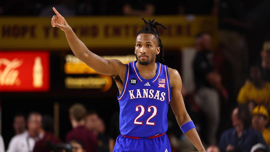 Mar 3, 2026; Tempe, Arizona, USA; Kansas Jayhawks guard Darryn Peterson (22) reacts against the Arizona State Sun Devils in the first half at Desert Financial Arena. Mandatory Credit: Mark J. Rebilas-Imagn Images