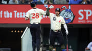 May 17, 2024; Arlington, Texas, USA; Texas Rangers catcher Jonah Heim (28) is congratulated by