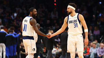 Dec 27, 2024; Phoenix, Arizona, USA; Dallas Mavericks guard Kyrie Irving (11) and Klay Thompson (31) against the Phoenix Suns at Footprint Center. Mandatory Credit: Mark J. Rebilas-Imagn Images