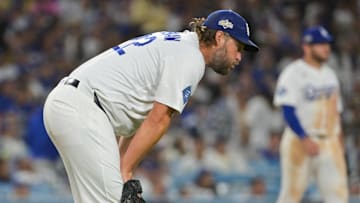 Oct 8, 2025; Los Angeles, California, USA; Los Angeles Dodgers pitcher Clayton Kershaw (22) reacts after giving up a home run during the eighth inning against the Philadelphia Phillies during game three of the NLDS round for the 2025 MLB playoffs at Dodger Stadium.