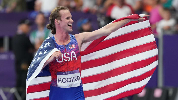 Aug 6, 2024; Saint-Denis, FRANCE; Cole Hocker (USA) celebrates after winning the men's 1500m final during the Paris 2024 Olympic Summer Games at Stade de France. Mandatory Credit: James Lang-USA TODAY Sports