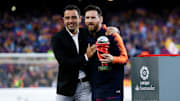 Xavi Hernández y Leo Messi