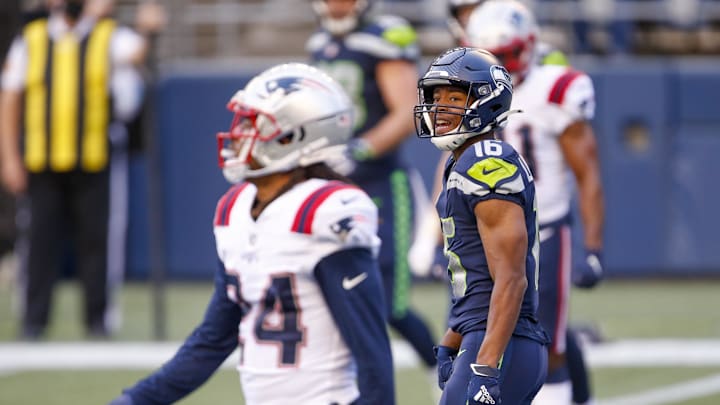 Sep 20, 2020; Seattle, Washington, USA; Seattle Seahawks wide receiver Tyler Lockett (16) reacts after catching a touchdown pass against the New England Patriots during the first quarter at CenturyLink Field. Mandatory Credit: Joe Nicholson-Imagn Images