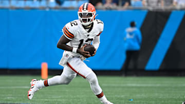 Aug 8, 2025; Charlotte, North Carolina, USA; Cleveland Browns quarterback Shedeur Sanders (12) with the ball in the first quarter at Bank of America Stadium. Mandatory Credit: Bob Donnan-Imagn Images