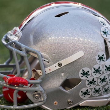 Nov 17, 2012; Madison, WI, USA;  A Ohio State Buckeyes helmet sits on the sidelines during the game against the Wisconsin Badgers at Camp Randall Stadium.  Ohio State defeated Wisconsin 21-14 in overtime.  Mandatory Credit: Jeff Hanisch-Imagn Images