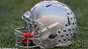Nov 17, 2012; Madison, WI, USA;  A Ohio State Buckeyes helmet sits on the sidelines during the game against the Wisconsin Badgers at Camp Randall Stadium.  Ohio State defeated Wisconsin 21-14 in overtime.  Mandatory Credit: Jeff Hanisch-Imagn Images