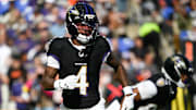 Oct 26, 2025; Baltimore, Maryland, USA; Baltimore Ravens wide receiver Zay Flowers (4) looks on during the third quarter against the Chicago Bears  at M&T Bank Stadium. 