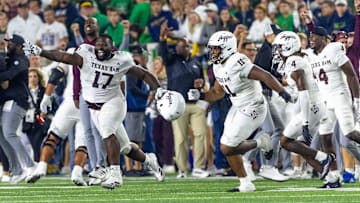 Sep 13, 2025; South Bend, Indiana, USA; Texas A&M Aggies celebrate beating the Notre Dame Fighting Irish at Notre Dame Stadium. Mandatory Credit: Michael Caterina-Imagn Images