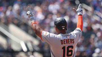 Aug 3, 2025; New York City, New York, USA; San Francisco Giants designated hitter Rafael Devers (16) reacts after hitting an RBI singe during the fourth inning against the New York Mets  at Citi Field. Mandatory Credit: Vincent Carchietta-Imagn Images