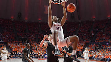 Feb 15, 2025; Champaign, Illinois, USA;  Illinois Fighting Illini forward Morez Johnson Jr. (21) dunks the ball during the second half at State Farm Center. Mandatory Credit: Ron Johnson-Imagn Images