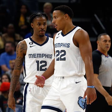 Memphis Grizzlies guard Ja Morant (12) and guard Desmond Bane (22) talk during the first half against the New York Knicks at FedExForum. 