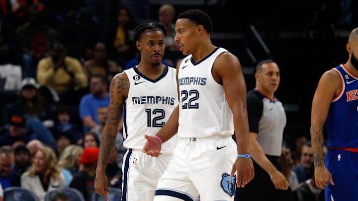 Memphis Grizzlies guard Ja Morant (12) and guard Desmond Bane (22) talk during the first half against the New York Knicks at FedExForum. 