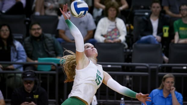 Oregon outside hitter Mimi Colyer hits the ball as Oregon volleyball takes on Portland State