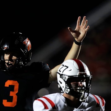 West De Pere quarterback Patrick Greisen (3) celebrates a touchdown versus Pulaski during a Fox River Classic Conference (North Division) game on Sept. 19, 2025.
