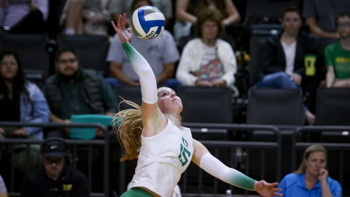 Oregon outside hitter Mimi Colyer hits the ball as Oregon volleyball takes on Portland State in an exhibition match Saturday, Aug. 19, 2023, at Matthew Knight Arena in Eugene.