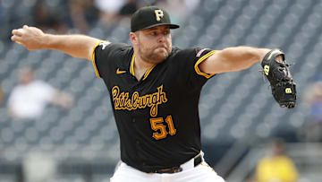 Aug 28, 2024; Pittsburgh, Pennsylvania, USA;  Pittsburgh Pirates relief pitcher David Bednar (51) pitches against the Chicago Cubs during the ninth inning at PNC Park. Chicago won 14-10.Mandatory Credit: Charles LeClaire-Imagn Images