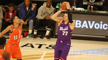Feb 14, 2020; Chicago, Illinois, USA; World forward Luka Doncic of the Dallas Mavericks shoots over USA guard Trae Young of the Atlanta Hawks during the NBA Rising Stars basketball game at United Center. Mandatory Credit: Dennis Wierzbicki-Imagn Images