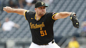 Aug 28, 2024; Pittsburgh, Pennsylvania, USA;  Pittsburgh Pirates relief pitcher David Bednar (51) pitches against the Chicago Cubs during the ninth inning at PNC Park. Chicago won 14-10.Mandatory Credit: Charles LeClaire-Imagn Images