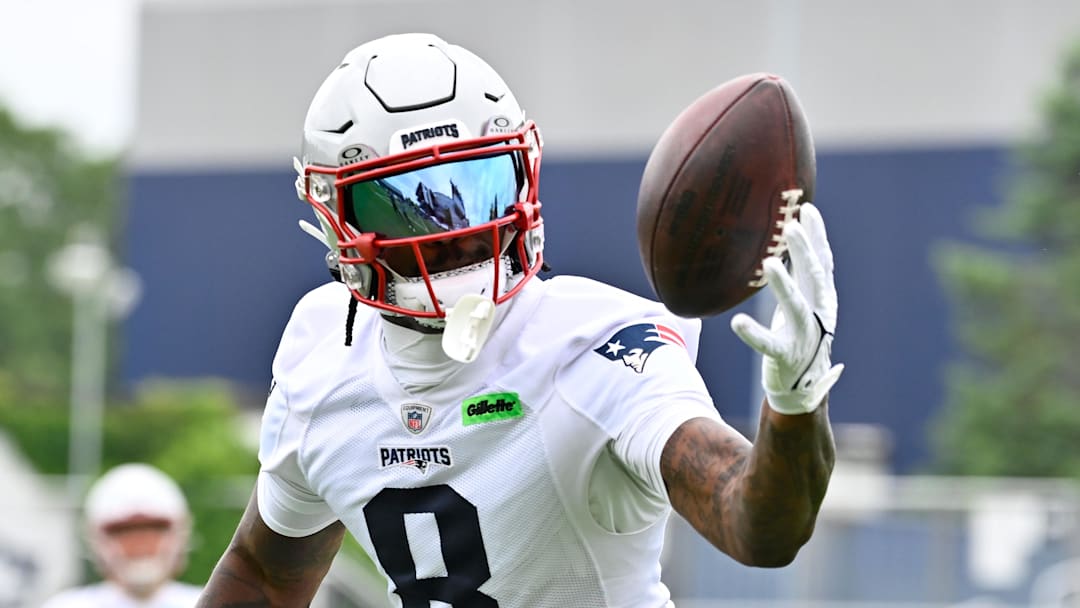Jun 9, 2025; Foxborough, MA, USA; New England Patriots wide receiver Stefon Diggs (8) tries to catch the ball during minicamp at Gillette Stadium. Mandatory Credit: Eric Canha-Imagn Images