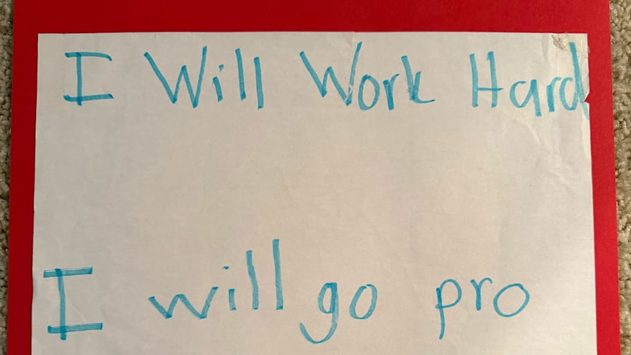 A paper that says: ‘I will work hard. I will go pro.’