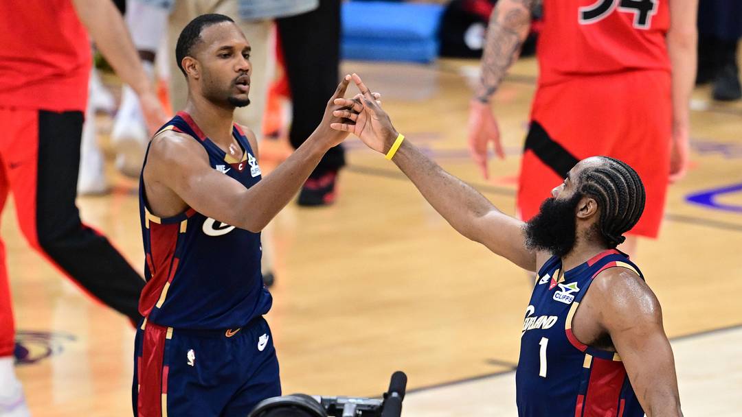 Apr 20, 2026; Cleveland, Ohio, USA; Cleveland Cavaliers center Evan Mobley (4) and guard James Harden (1) celebrates after the Cavaliers defeated the Toronto Raptors in game two of the first round of the 2026 NBA Playoffs at Rocket Arena. Mandatory Credit: David Dermer-Imagn Images