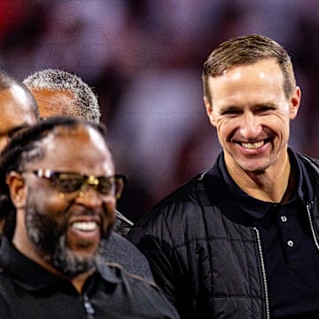 Nov 17, 2024; New Orleans, Louisiana, USA;  Former New Orleans Saints quarterback Drew Brees during the half time Ring of Honor ceremony for Jahri Evans at Caesars Superdome. Mandatory Credit: Stephen Lew-Imagn Images
