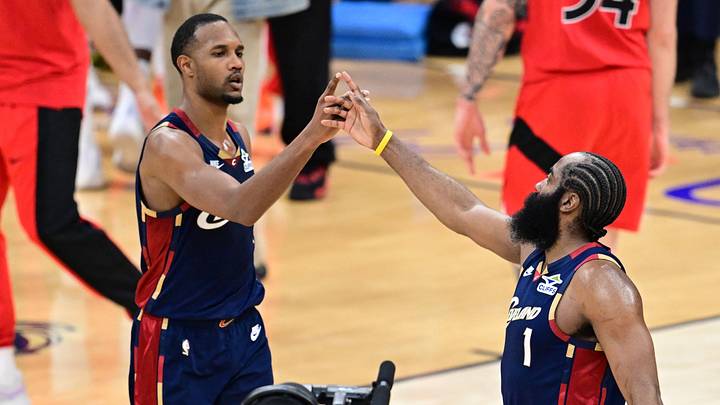 Apr 20, 2026; Cleveland, Ohio, USA; Cleveland Cavaliers center Evan Mobley (4) and guard James Harden (1) celebrates after the Cavaliers defeated the Toronto Raptors in game two of the first round of the 2026 NBA Playoffs at Rocket Arena. Mandatory Credit: David Dermer-Imagn Images