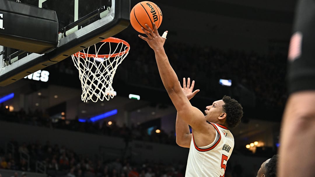 Mar 20, 2026; St. Louis, MO, USA; Miami (FL) Hurricanes forward Malik Reneau (5) shoots for the basket during the second half against the Missouri Tigers during a first round game of the men's 2026 NCAA Tournament at Enterprise Center. Mandatory Credit: Jeff Le-Imagn Images
