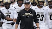 Purdue Boilermakers head coach Barry Odom takes the field 