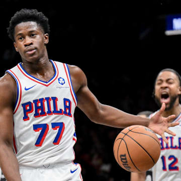 Nov 2, 2025; Brooklyn, New York, USA; Philadelphia 76ers guard VJ Edgecombe (77) reacts after a dunk against the Brooklyn Nets during the first half at Barclays Center. Mandatory Credit: John Jones-Imagn Images