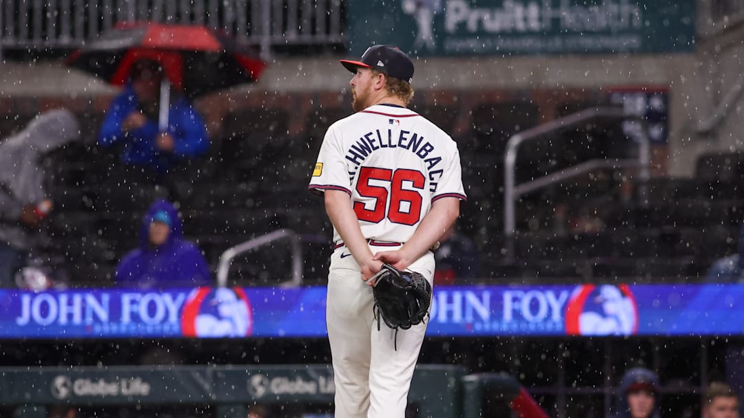Apr 10, 2025; Atlanta, Georgia, USA; Atlanta Braves starting pitcher Spencer Schwellenbach (56) walks off the field against the Philadelphia Phillies during a rain delay in the seventh inning at Truist Park. Mandatory Credit: Brett Davis-Imagn Images
