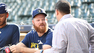 Oct 3, 2023; Milwaukee, Wisconsin, USA; Milwaukee Brewers starting pitcher Brandon Woodruff (53), who recently was ruled out for the Wildcard series is seen out front of the dug out before their game against the Arizona Diamondbacks during game one of the Wildcard series for the 2023 MLB playoffs at American Family Field. Mandatory Credit: Michael McLoone-Imagn Images
