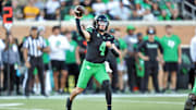 Nov 9, 2024; Denton, Texas, USA; North Texas Mean Green quarterback Chandler Morris (4) throws a pass against the Army Black Knights during the second half at DATCU Stadium. Mandatory Credit: Danny Wild-Imagn Images