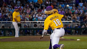 Jun 21, 2023; Omaha, NE, USA; LSU Tigers first baseman Tre' Morgan (18) gets an out at first base to defeat the Wake Forest Demon Deacons at Charles Schwab Field Omaha. Mandatory Credit: Dylan Widger-USA TODAY Sports
