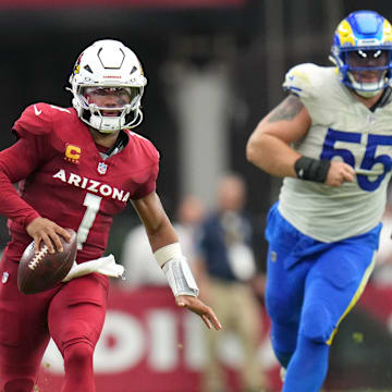 Arizona Cardinals quarterback Kyler Murray (1) scrambles past Los Angeles Rams defensive lineman Braden Fiske (55) on Sept. 15, 2024, at State Farm Stadium in Glendale.