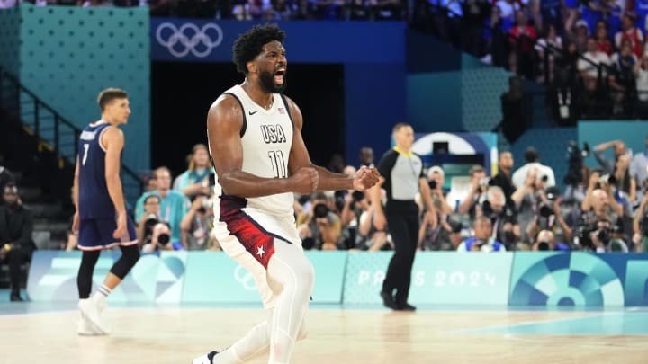 Aug 8, 2024; Paris, France; United States centre Joel Embiid (11) celebrates during the second half against Serbia in a men's basketball semifinal game during the Paris 2024 Olympic Summer Games at Accor Arena. Mandatory Credit: Rob Schumacher-USA TODAY Sports