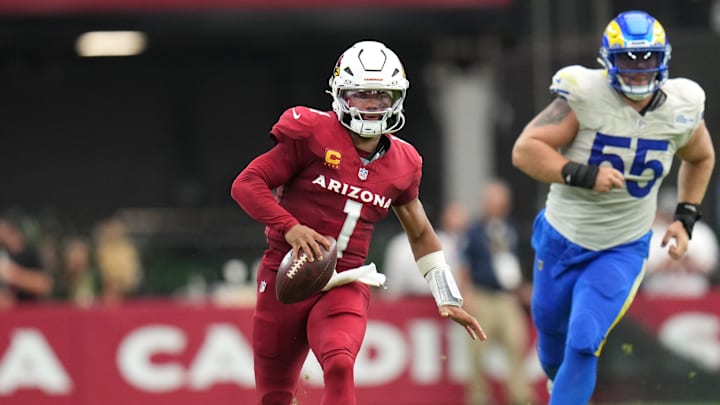 Arizona Cardinals quarterback Kyler Murray (1) scrambles past Los Angeles Rams defensive lineman Braden Fiske (55) on Sept. 15, 2024, at State Farm Stadium in Glendale.