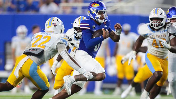 Kansas Jayhawks quarterback Isaiah Marshall (8) runs the ball during the game against LIU Sharks inside David Booth Kansas Memorial Stadium on Sept. 4, 2026.