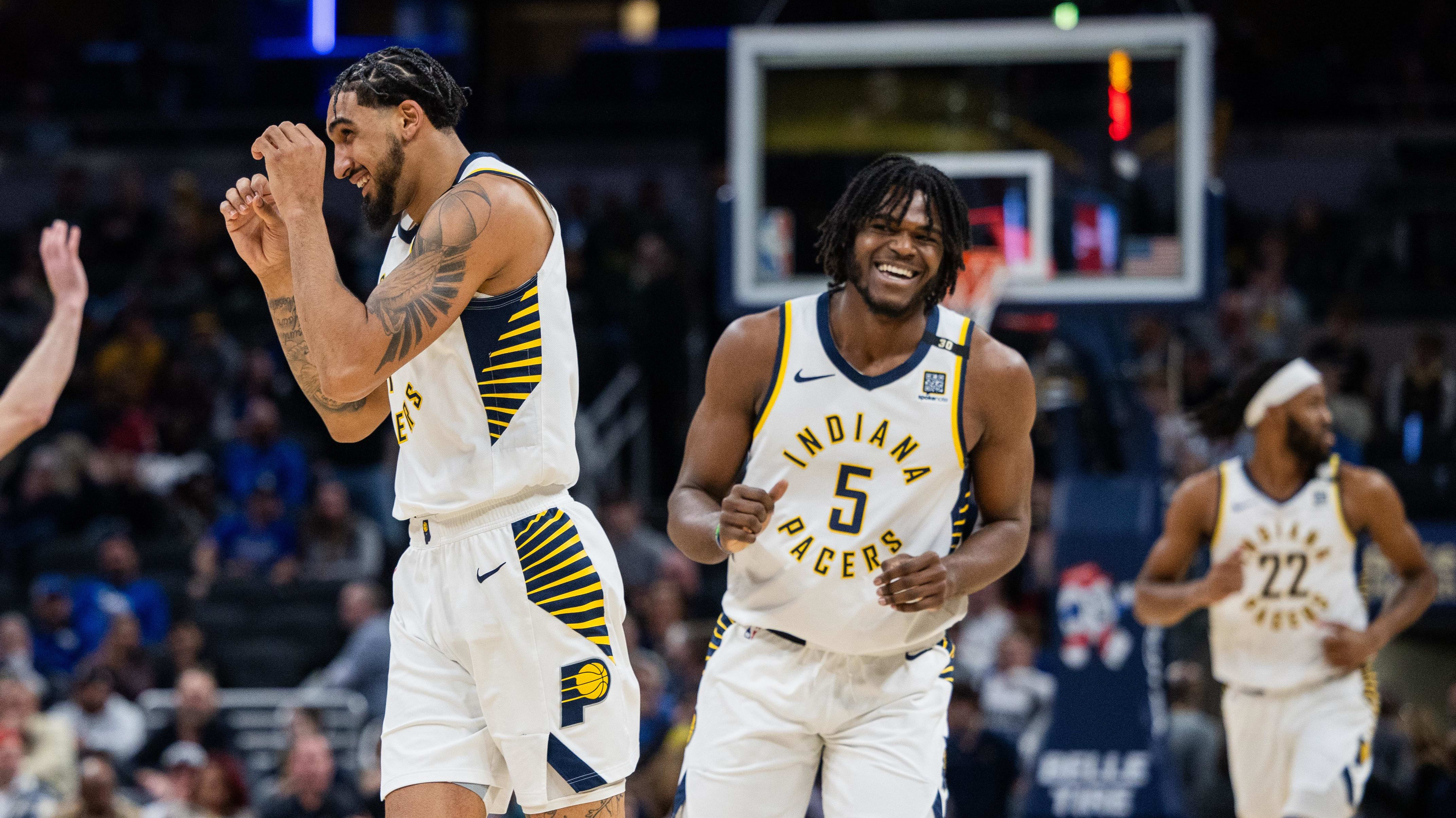 Feb 25, 2024; Indianapolis, Indiana, USA; Indiana Pacers forwards Obi Toppin (1) and Jarace Walker (5) celebrate a made basket.